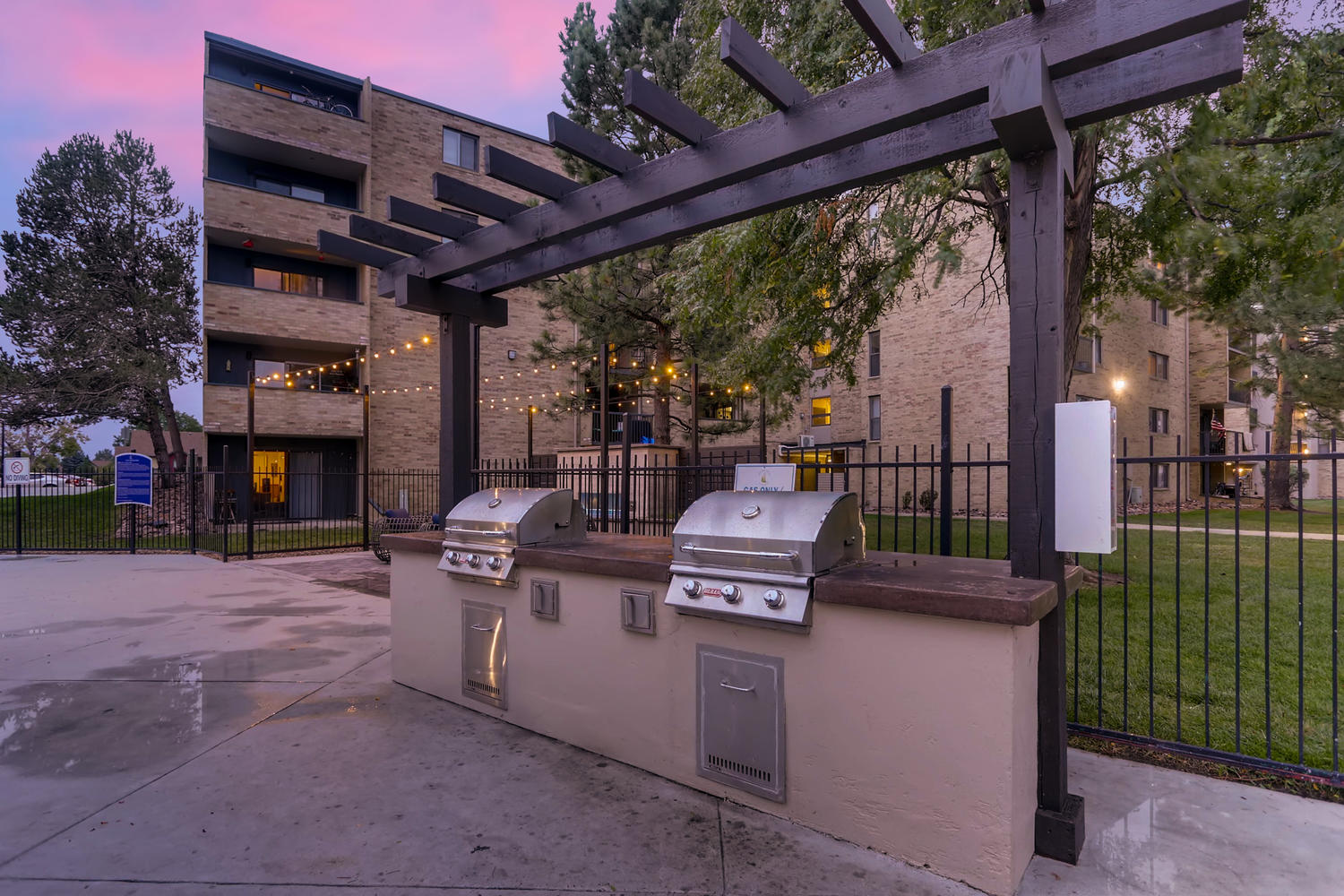 Outdoor grills next to the pool